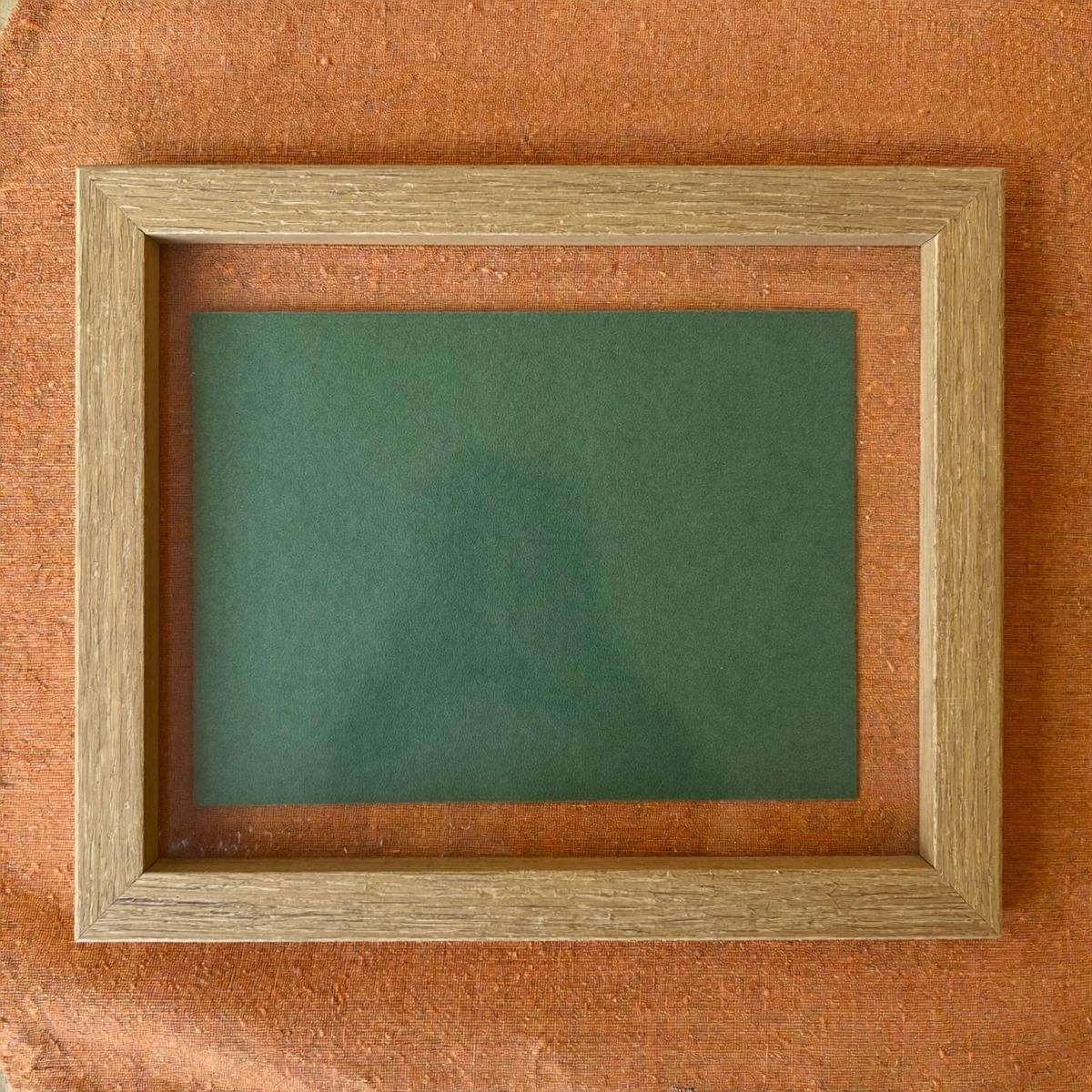 A small oak picture frame.