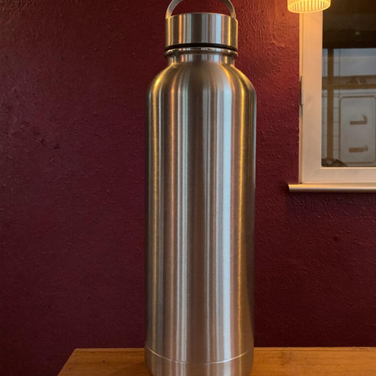 An insulated steel water bottle.